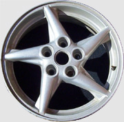 Corroded factory wheel before refinishing